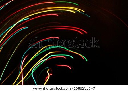 Abstract bright colorful motion background with blurred lights 