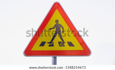 people walk crosswalk warning triangle sign 