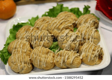 Bread roll snacks at the stand-up party or buffet lunch. Tasty food treats on the table. Catering service.