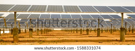 Solar photovoltaic base built in the desert Royalty-Free Stock Photo #1588331074