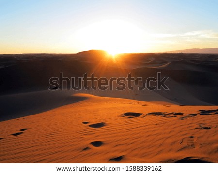 Sun Rising in the Sahara Desert, Morocco.