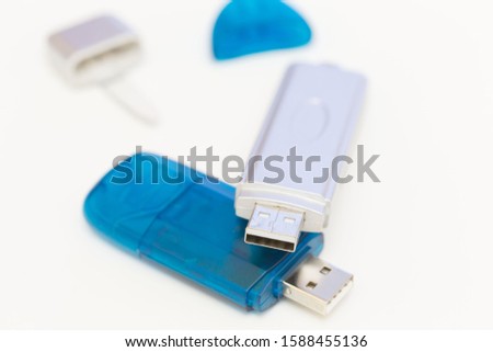 Isolated USB pen stick modem device in white background. Network thumbdrive technology. Business process style. Computer flash connector.
