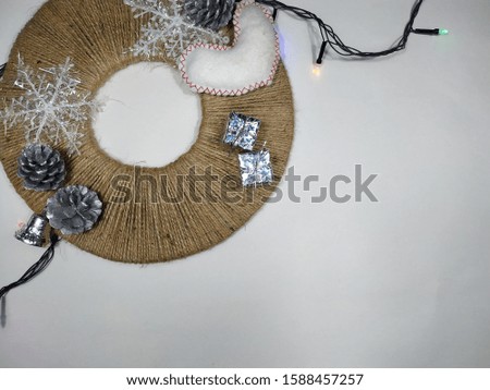 Handmade Christmas wreath on a white background