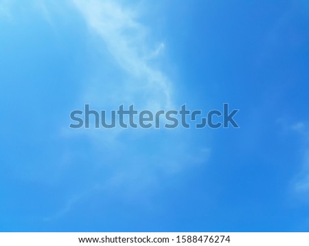 clear sky with clouds , blue background
