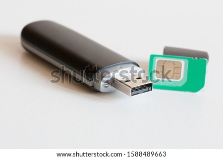 Isolated USB pen stick modem device in white background. Network thumbdrive technology. Business process style. Computer flash connector.