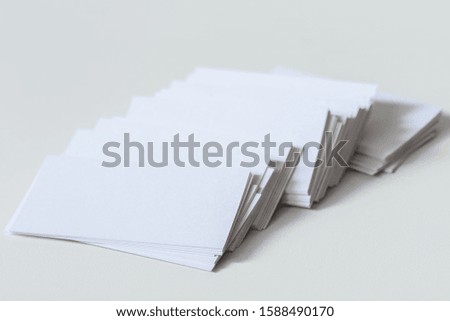 Beautiful business cards on white background. Work design view. Cardboard paper style. 