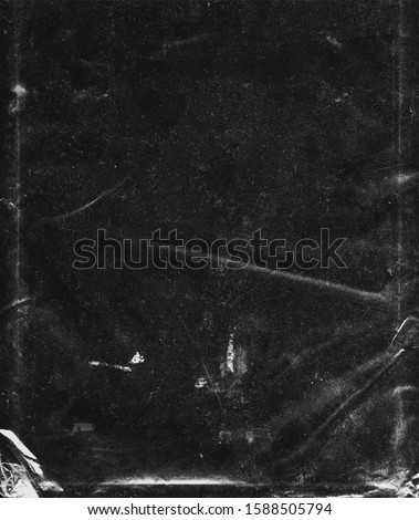 Texture of Clear Plastic Bag on Black Background Royalty-Free Stock Photo #1588505794