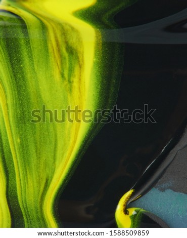 Abstract colorful liquid background close up view