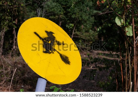witch warning sign in a forest, Slovenia, Europe