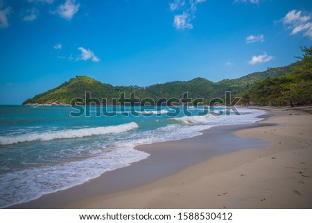 tropical beach and blue sky background.soft focus,grain,Select focus, blur.