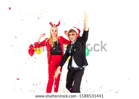 young people man and woman enjoy with colorful confetti in new year celebration hangout party and isolated on white background