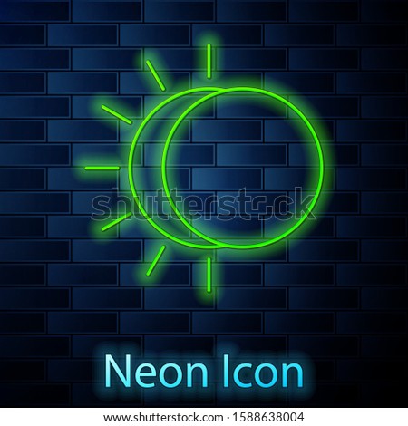 Glowing neon line Eclipse of the sun icon isolated on brick wall background. Total sonar eclipse.  Vector Illustration