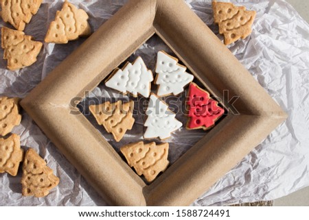 Christmas tree-shaped cookies made by hand with the pasta cutter