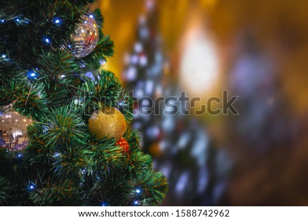 close up of Decorated on Christmas tree with blurred background.