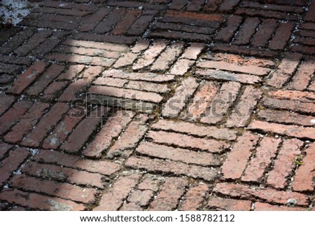 antique clinker brick city square pavement, Italy