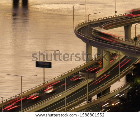 Car light trails on a motorway overpass system over the Brisbane River, Brisbane, Queensland, Australia