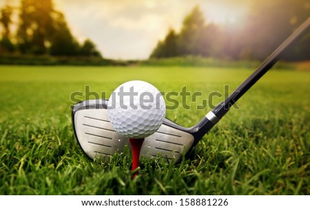 Golf club and ball in grass Royalty-Free Stock Photo #158881226