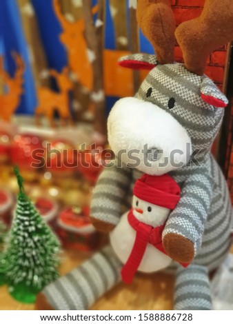 Doll cute reindeer and doll snowman decorated celebrate the Christmas festival. xmas background.