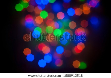 Dark background with colorful lights