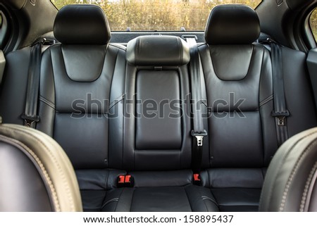 Black color skin luxury town car passengers interior Royalty-Free Stock Photo #158895437