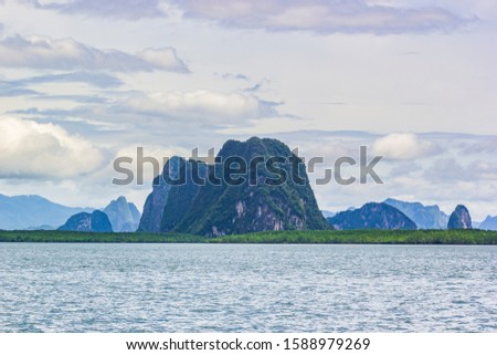 The sea, the mountains in Phang Nga Bay, Phangnga THAILAND.