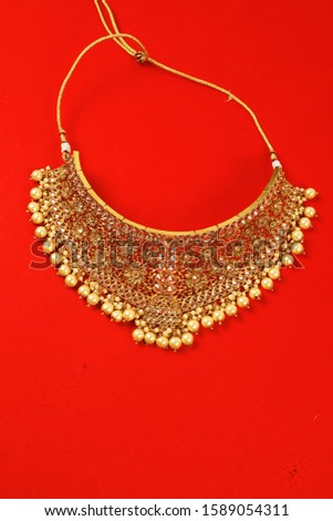 Authentic Traditional Indian Jewellery Necklace On Dark Background. Wear in Neck in Wedding, Festivals And Other Occasion. Very Useful Image For Website, Printing & Mobile Application.