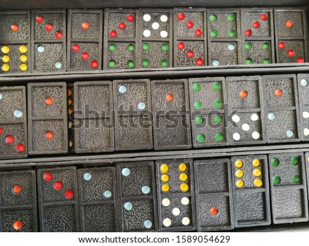 Domino game divided into two squares having 0 to 6 dots as in dice.