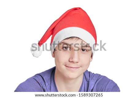 teen is ready for the new year in Santa's hat