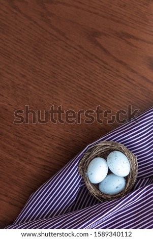 Easter eggs on wooden table the simple rustic background, easter holiday concept. Copy space for text. 