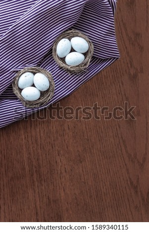 Easter eggs on wooden table the simple rustic background, easter holiday concept. Copyspace for text. 