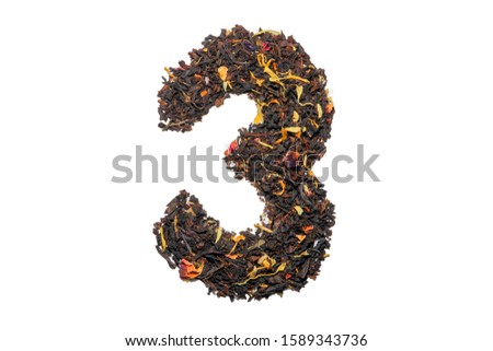 figure three of black tea with flower petals and pieces of fruit isolate