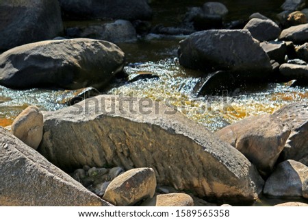 Stone texture at the stream of hot spring