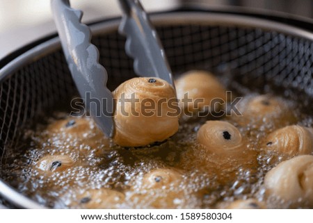 Preparation of Puff pastry dough for the Fried Chinese pastry.