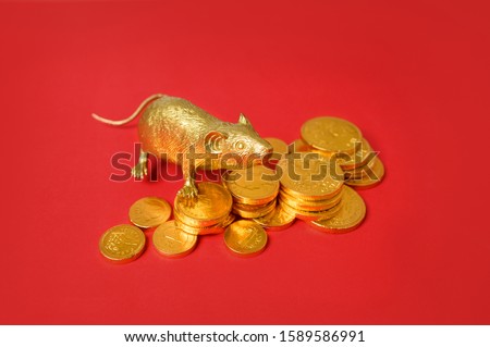 Gold Rat zodiac and gold coins stack with red background, Happy New Years Chinese.
