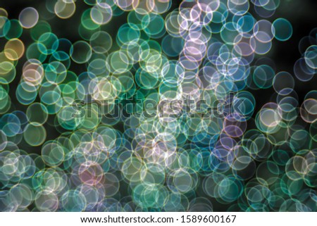 Festive Christmas elegant abstract background with booble bokeh multicolored lights. Background with defocused lights. Classic bokeh .Copy space.