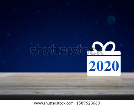 Gift box happy new year 2020 flat icon on wooden table over fantasy night sky and moon, Business shop online concept