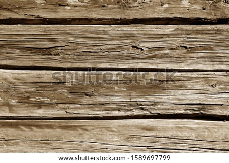 Old grungy wooden planks background in brown tone. Abstract background and texture for design.