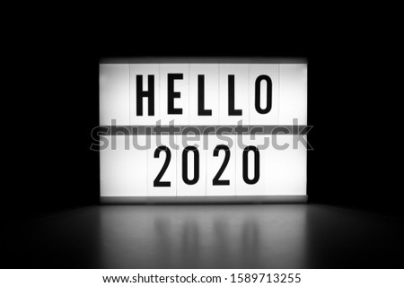 Hello 2020 - text on a display lightbox in the dark