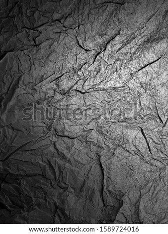 A sheet of crumpled paper. Background and texture for designers