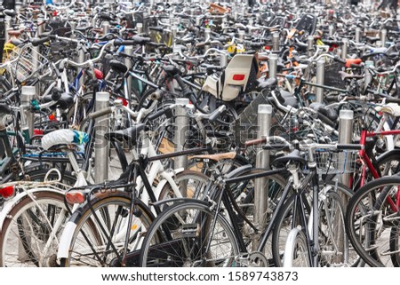 Downtown urban parking lot for bikes in Copenhague. Ecology transport