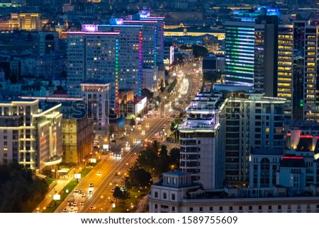 Moscow. Russia. Multi-lane road. Night Moscow view from above. Cars rides through the evening city. Road architecture of Russia. Lights of the night city. Russia region. Tour Russian Federation