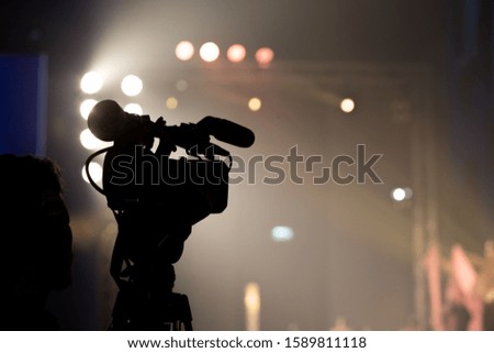 Video Production Camera social network live recording on Stage event which has interview session of contest, performance, concert or business seminar.  World Class Stage and ob switch team, silhouette