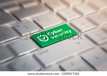 cyber security green button on the keyboard.
