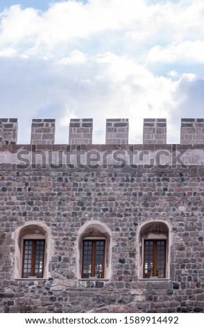 old stone castle bastion. windows