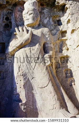 The statue of Giants on the exterior wall of North binyang cave as protecting guard for Buddha