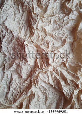 A sheet of crumpled paper. Background and texture for designers