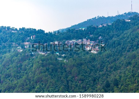 View from Mall road in Mcleodganj hill station in Himachal Pradesh, India. It's culture is a beautiful blend of Tibetan with some British influence. Green nature Dharamshala- Image
