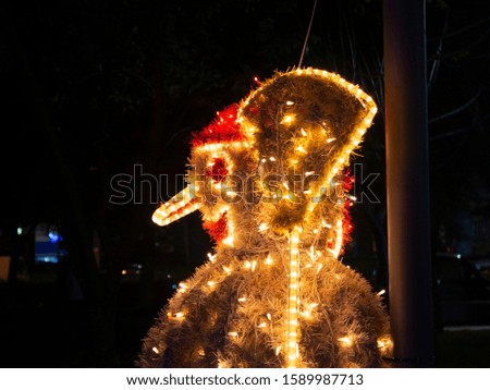 snowman in the night ligths