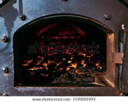 Vintage furnace with coal burning inside