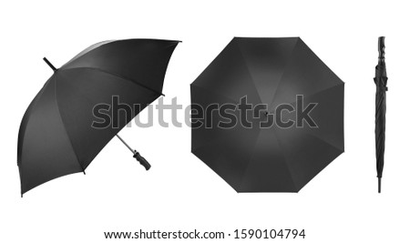 A set of classic umbrella or parasol with long straight handle in black colour. Different angel shoots Isolated on white background. It is designed to protect a person against rain or sunlight Royalty-Free Stock Photo #1590104794